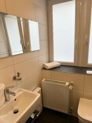 Ein Badezimmer in der Unterkunft Tondose Apartment