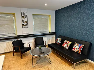Ein Sitzbereich in der Unterkunft Tondose Apartment
