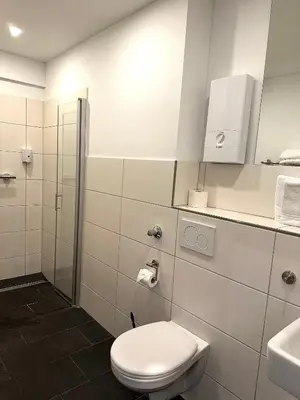 Ein Badezimmer in der Unterkunft Tondose Apartment