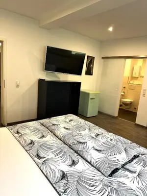 Ein Bett oder Betten in einem Zimmer der Unterkunft Tondose Apartment