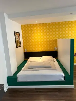 Ein Bett oder Betten in einem Zimmer der Unterkunft Tondose Apartment