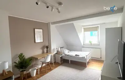 Ein Bett oder Betten in einem Zimmer der Unterkunft BEGE APARTMENTS WorkHub Retreat