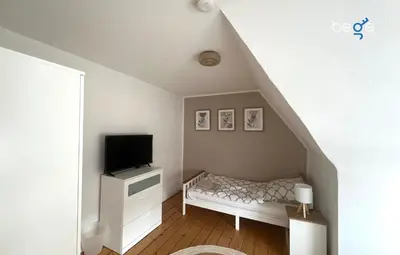 TV/Unterhaltungsangebot in der Unterkunft BEGE APARTMENTS WorkHub Retreat