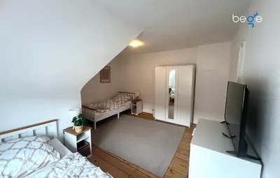 Ein Bett oder Betten in einem Zimmer der Unterkunft BEGE APARTMENTS WorkHub Retreat