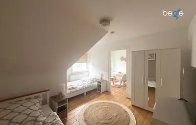 Ein Bett oder Betten in einem Zimmer der Unterkunft BEGE APARTMENTS WorkHub Retreat