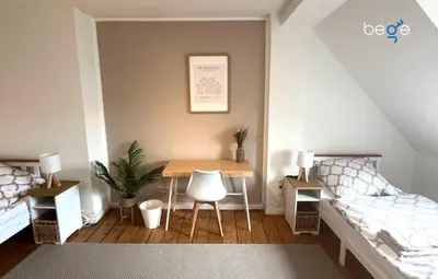 Ein Bett oder Betten in einem Zimmer der Unterkunft BEGE APARTMENTS WorkHub Retreat
