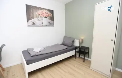 Ein Bett oder Betten in einem Zimmer der Unterkunft BEGE APARTMENTS ComfyStay