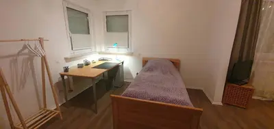 Ein Bett oder Betten in einem Zimmer der Unterkunft Apartment mit eigenem Eingang im Zentrum von Selm