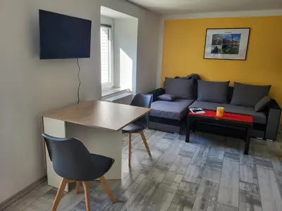 Ein Sitzbereich in der Unterkunft Ferienwohnung Muttental