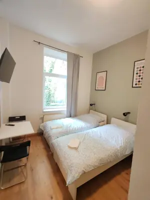 Ein Bett oder Betten in einem Zimmer der Unterkunft 2-Bed Apartment • Ideal for Workers & Short Stays