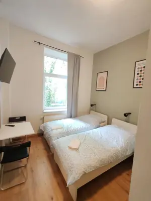 Ein Bett oder Betten in einem Zimmer der Unterkunft 2-Bed Apartment • Ideal for Workers & Short Stays