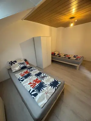 Ein Bett oder Betten in einem Zimmer der Unterkunft Platin Apartment