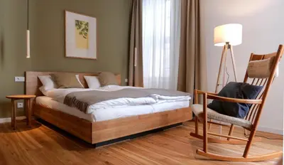 Ein Bett oder Betten in einem Zimmer der Unterkunft klein & fein Gästehaus