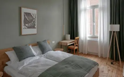 Ein Bett oder Betten in einem Zimmer der Unterkunft klein & fein Gästehaus