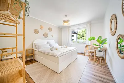 Ein Bett oder Betten in einem Zimmer der Unterkunft Gemütlich l Zentral l Parken l Universität l Balkon I Für 6