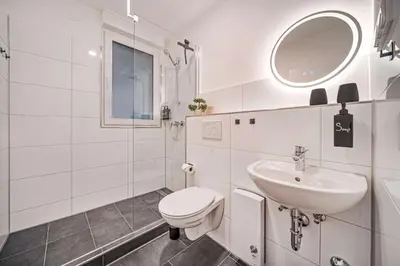 Ein Badezimmer in der Unterkunft Gemütlich l Zentral l Parken l Universität l Balkon I Für 6