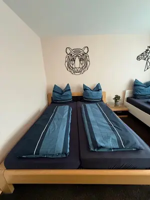 Ein Bett oder Betten in einem Zimmer der Unterkunft CAL Apartments