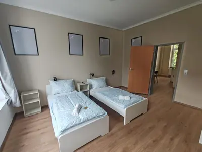 Ein Bett oder Betten in einem Zimmer der Unterkunft Stylish 1-Bedroom Apartment for Rent - Central Essen Location