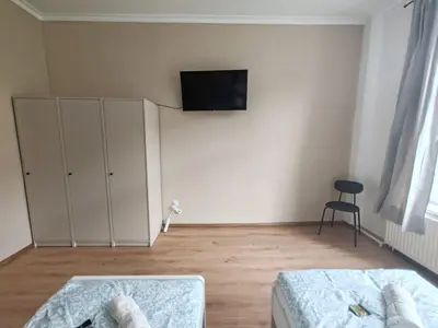 Ein Bett oder Betten in einem Zimmer der Unterkunft Stylish 1-Bedroom Apartment for Rent - Central Essen Location