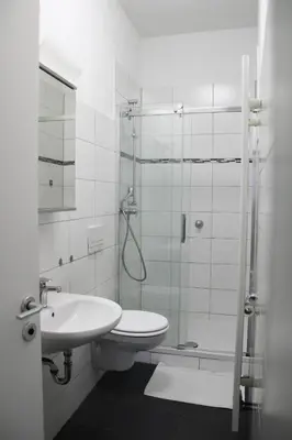 Ein Badezimmer in der Unterkunft RuhrpottImmo - Zentrale Wohnung in Iserlohn - bis zu 7 Pers