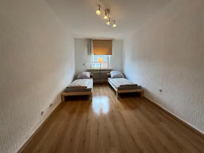 Ein Bett oder Betten in einem Zimmer der Unterkunft City-Apartment Monteur- & Ferienwohnung