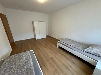 Ein Bett oder Betten in einem Zimmer der Unterkunft City-Apartment Monteur- & Ferienwohnung