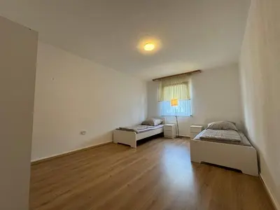 Ein Bett oder Betten in einem Zimmer der Unterkunft City-Apartment Monteur- & Ferienwohnung