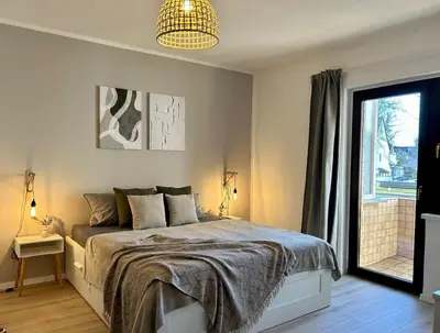 Ein Bett oder Betten in einem Zimmer der Unterkunft Apartment Alfred