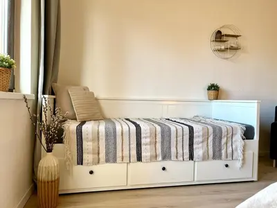Ein Bett oder Betten in einem Zimmer der Unterkunft Apartment Alfred