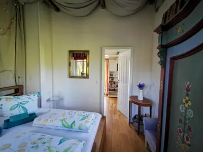 Ein Bett oder Betten in einem Zimmer der Unterkunft HR Cottage am Honigbach