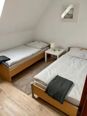 Ein Bett oder Betten in einem Zimmer der Unterkunft Ferienwohnung Gisela