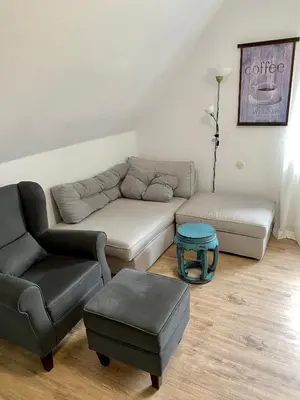 Ein Sitzbereich in der Unterkunft Ferienwohnung Gisela