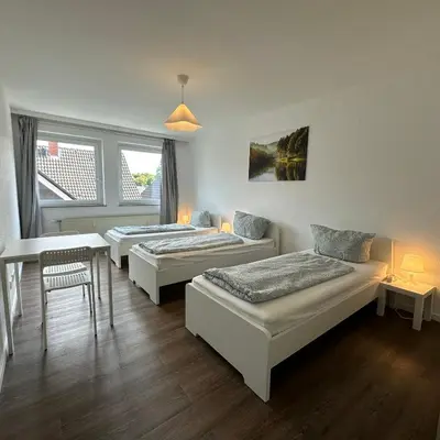 Ein Bett oder Betten in einem Zimmer der Unterkunft WDI - Workers Apartments