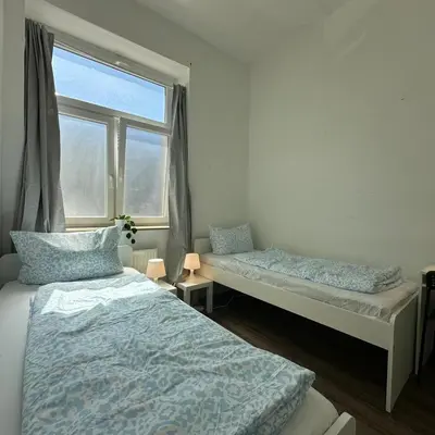 Ein Bett oder Betten in einem Zimmer der Unterkunft WDI - WorkersSpace