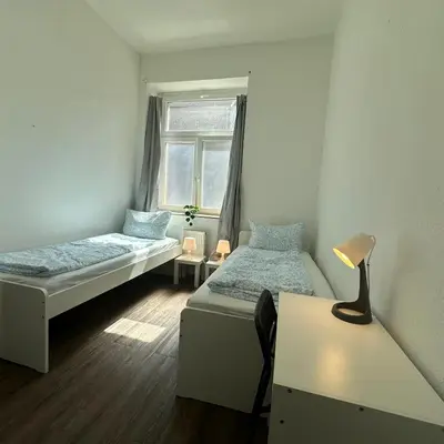 Ein Bett oder Betten in einem Zimmer der Unterkunft WDI - WorkersSpace