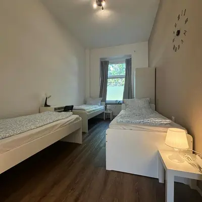 Ein Bett oder Betten in einem Zimmer der Unterkunft WDI - WorkersSpace