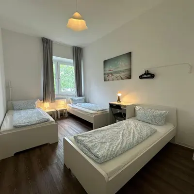 Ein Bett oder Betten in einem Zimmer der Unterkunft WDI - WorkersHome