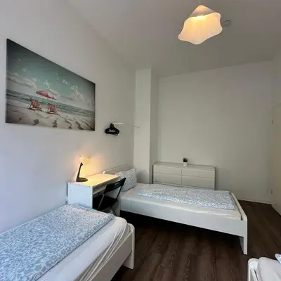 Ein Bett oder Betten in einem Zimmer der Unterkunft WDI - WorkersHome