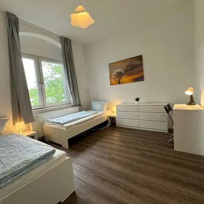 Ein Bett oder Betten in einem Zimmer der Unterkunft WDI - WorkersHome