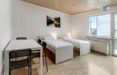 Ein Bett oder Betten in einem Zimmer der Unterkunft BEGE APARTMENTS FlexiStay