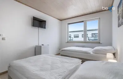 Ein Bett oder Betten in einem Zimmer der Unterkunft BEGE APARTMENTS FlexiStay
