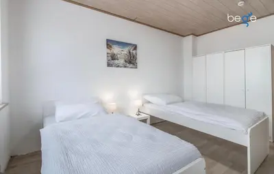 Ein Bett oder Betten in einem Zimmer der Unterkunft BEGE APARTMENTS FlexiStay
