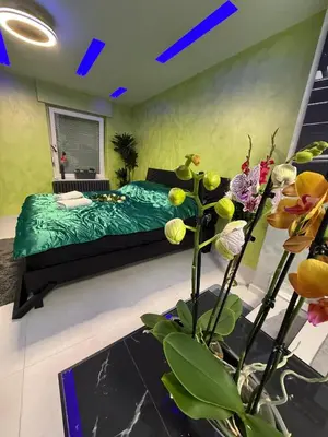 Ein Bett oder Betten in einem Zimmer der Unterkunft Ferienwohnung SPA Delluxe 2