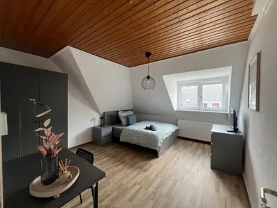 Ein Bett oder Betten in einem Zimmer der Unterkunft Socha Apartments Zuhause auf Zeit, Monteurwohnungen in Remscheid