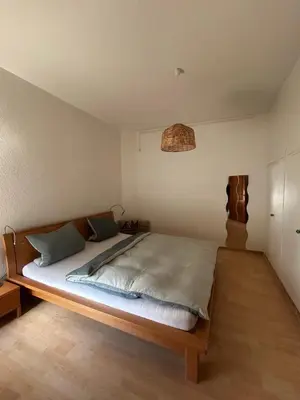 Ein Bett oder Betten in einem Zimmer der Unterkunft Zentral gelegen & sehr gut angebunden - Ihre gemütliche Ferienwohnung in Mülheim-Speldorf