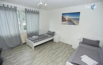 Ein Bett oder Betten in einem Zimmer der Unterkunft BEGE APARTMENTS NomaStay