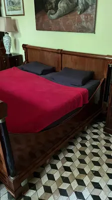 Ein Bett oder Betten in einem Zimmer der Unterkunft Villa Angela Neuer Rosengarten