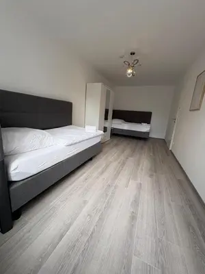 Ein Bett oder Betten in einem Zimmer der Unterkunft Ferienwohnung Ilana