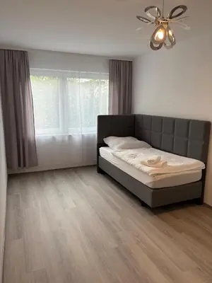 Ein Bett oder Betten in einem Zimmer der Unterkunft Ferienwohnung Ilana