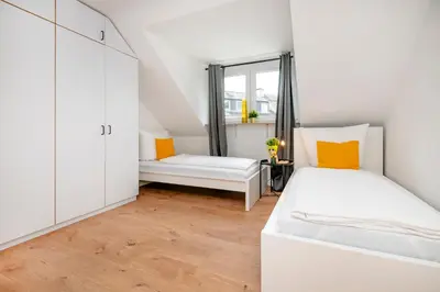 Ein Bett oder Betten in einem Zimmer der Unterkunft Kurzzeitglück 24h Self Check-In E04